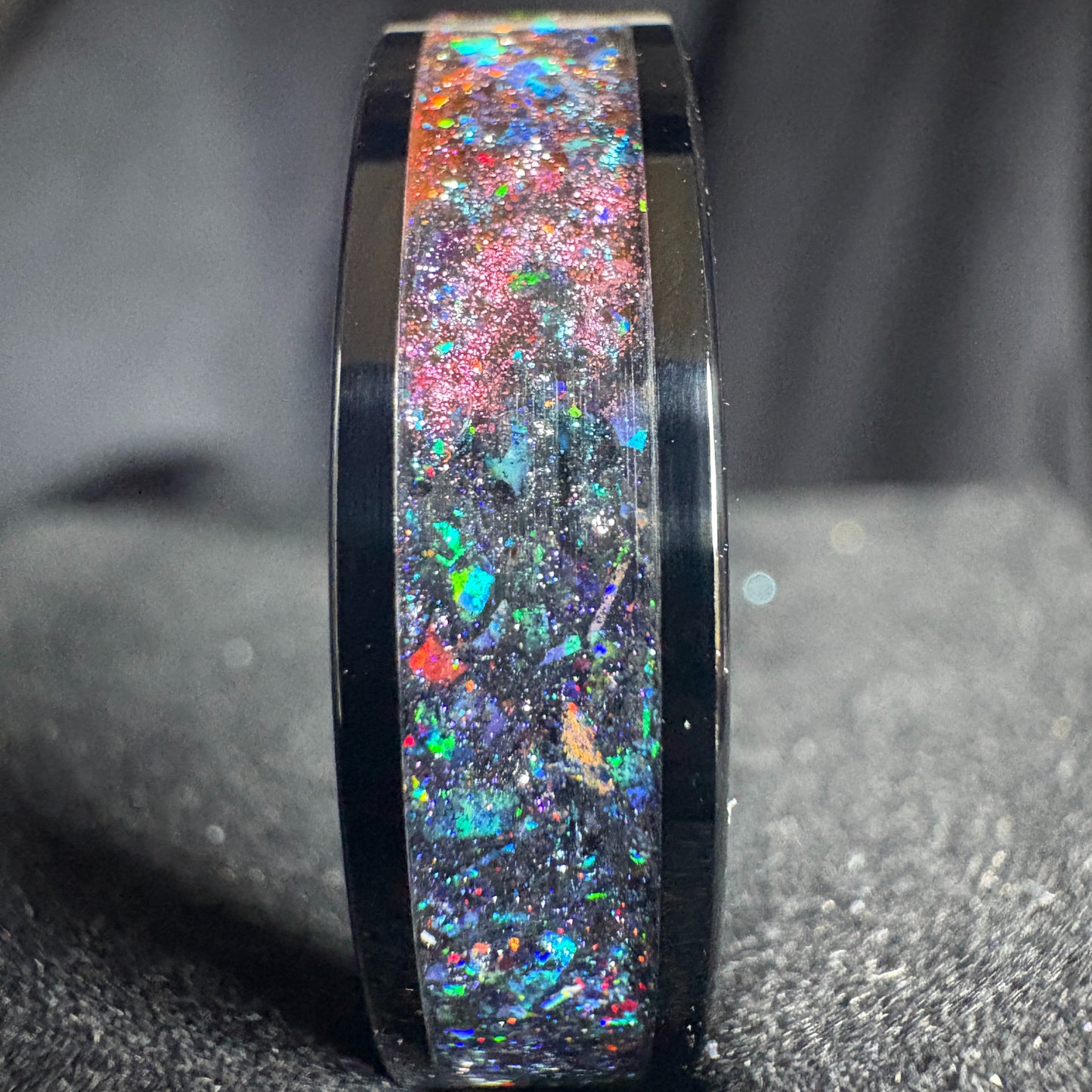 Black plated tungsten ring with multi color space themed shifting pigment powders and synthetic opals