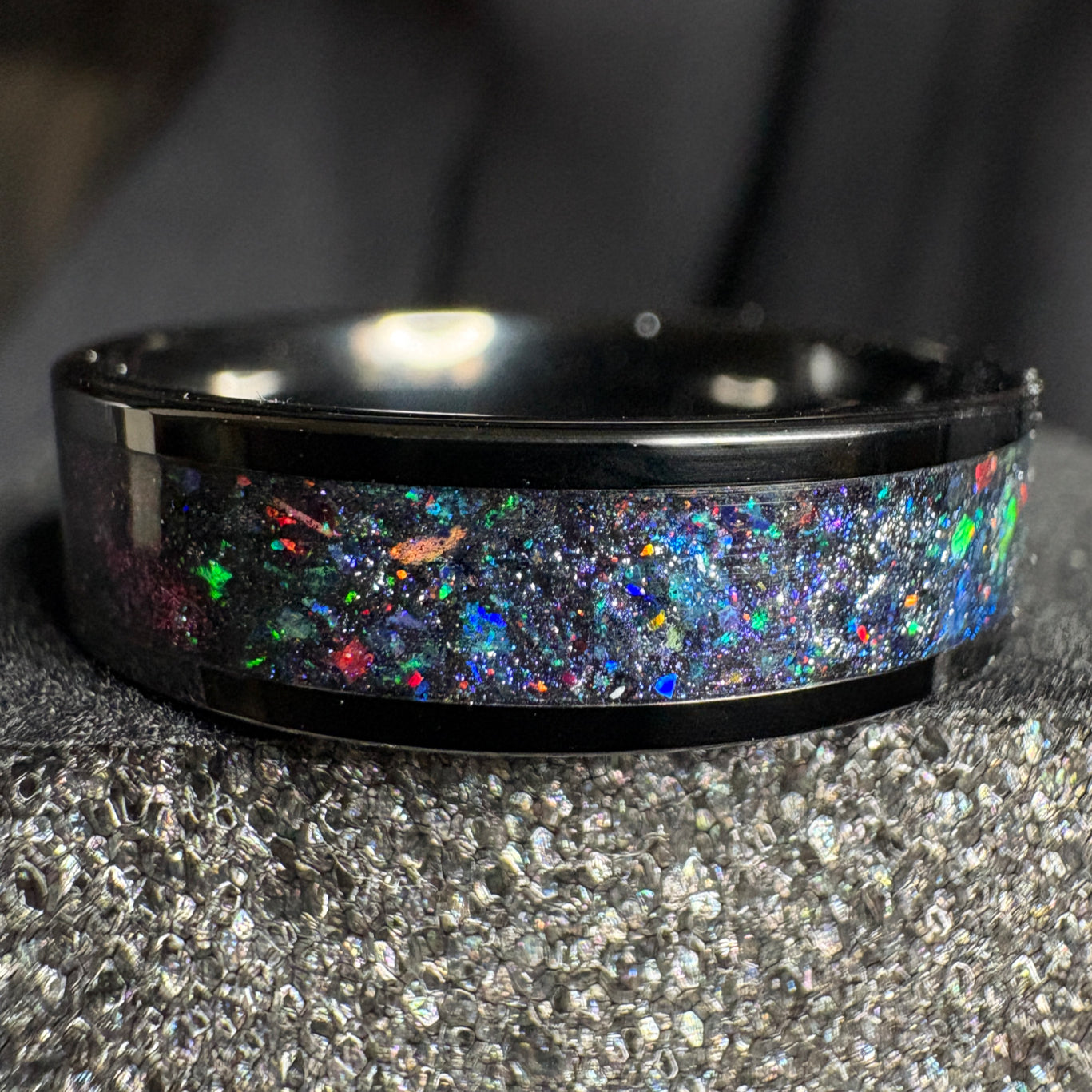 Black plated tungsten ring with multi color space themed shifting pigment powders and synthetic opals